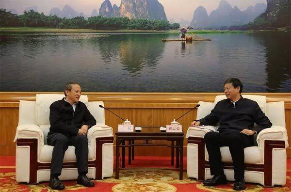 广西壮族自治区副主席费志荣在南宁会见了王民董事长