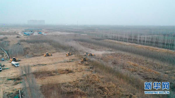 1月13日，中铁十四局集团工人在施工现场作业(无人机照片)。新华社记者 杨世尧 摄 图
